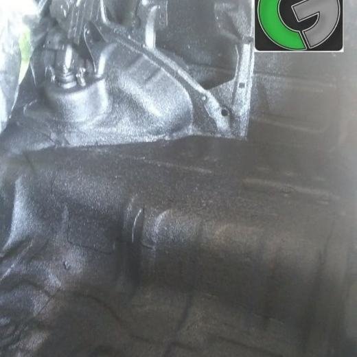 Spray-on protective coating inside a vehicle