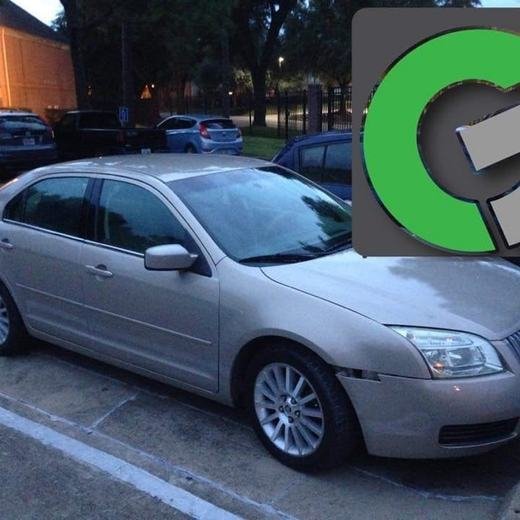 The same sedan after the fender and bumper repair