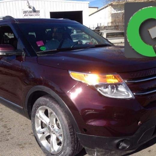 The same SUV after the front end was rebuilt and painted